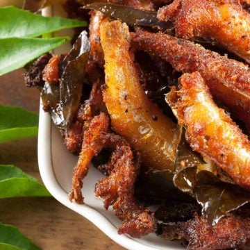 Crispy and spicy Anchovy or Kozhuva or Netholi fry. Anchovies marinated with spices and then shallow fried. A quite easy and tasty appetizer.