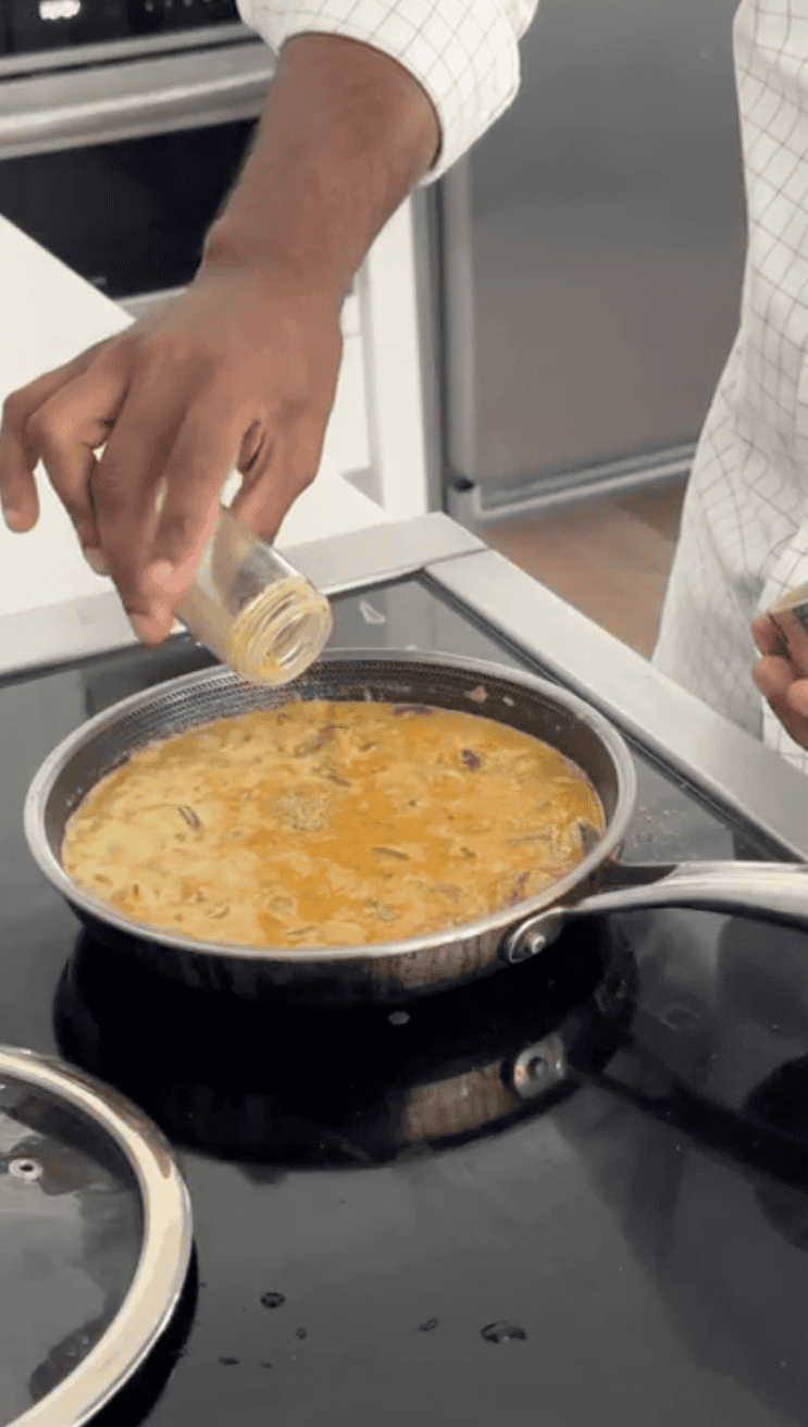 Adding seasoning to the leftover gravy.
